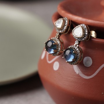 White stone earring